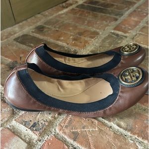 Tory Burch brown flats size 7.